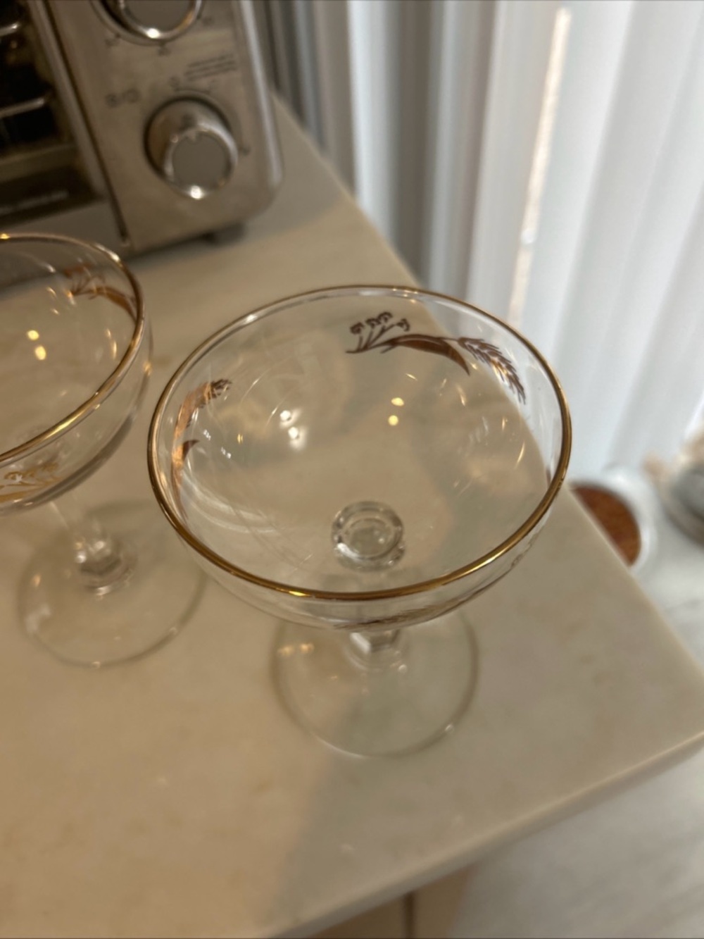 Elegant Clear Coupe Glass with Gold Trim